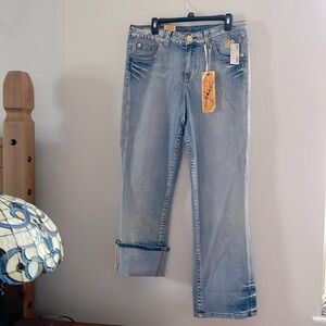 Jessica Simpson washed out blue jeans.